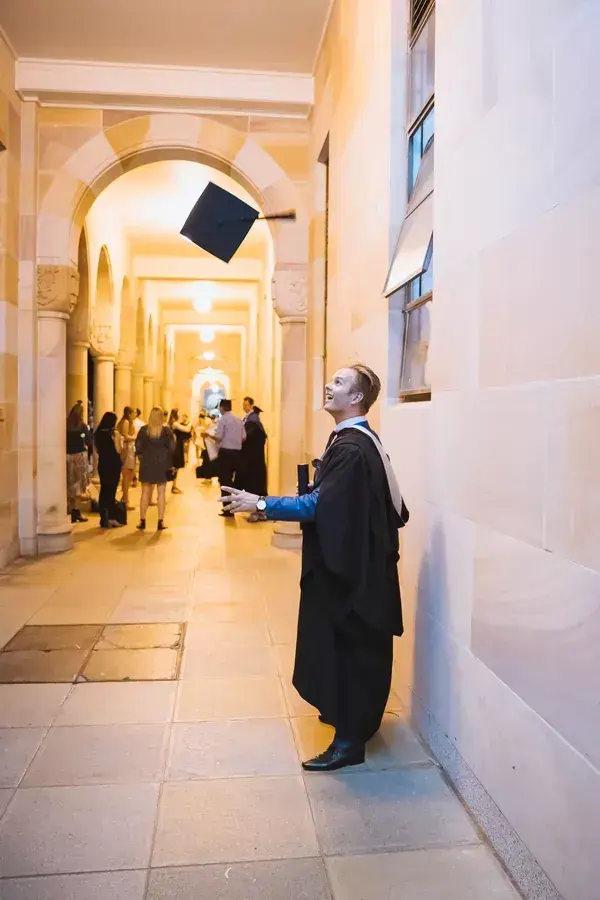 Graduate photographed in cap and gown