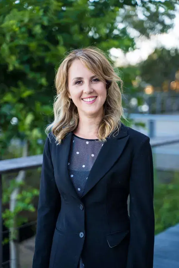 Professional headshot photographed outdoors in Brisbane