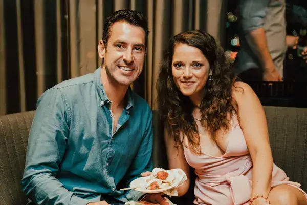 Couple at an outdoor party in the evening